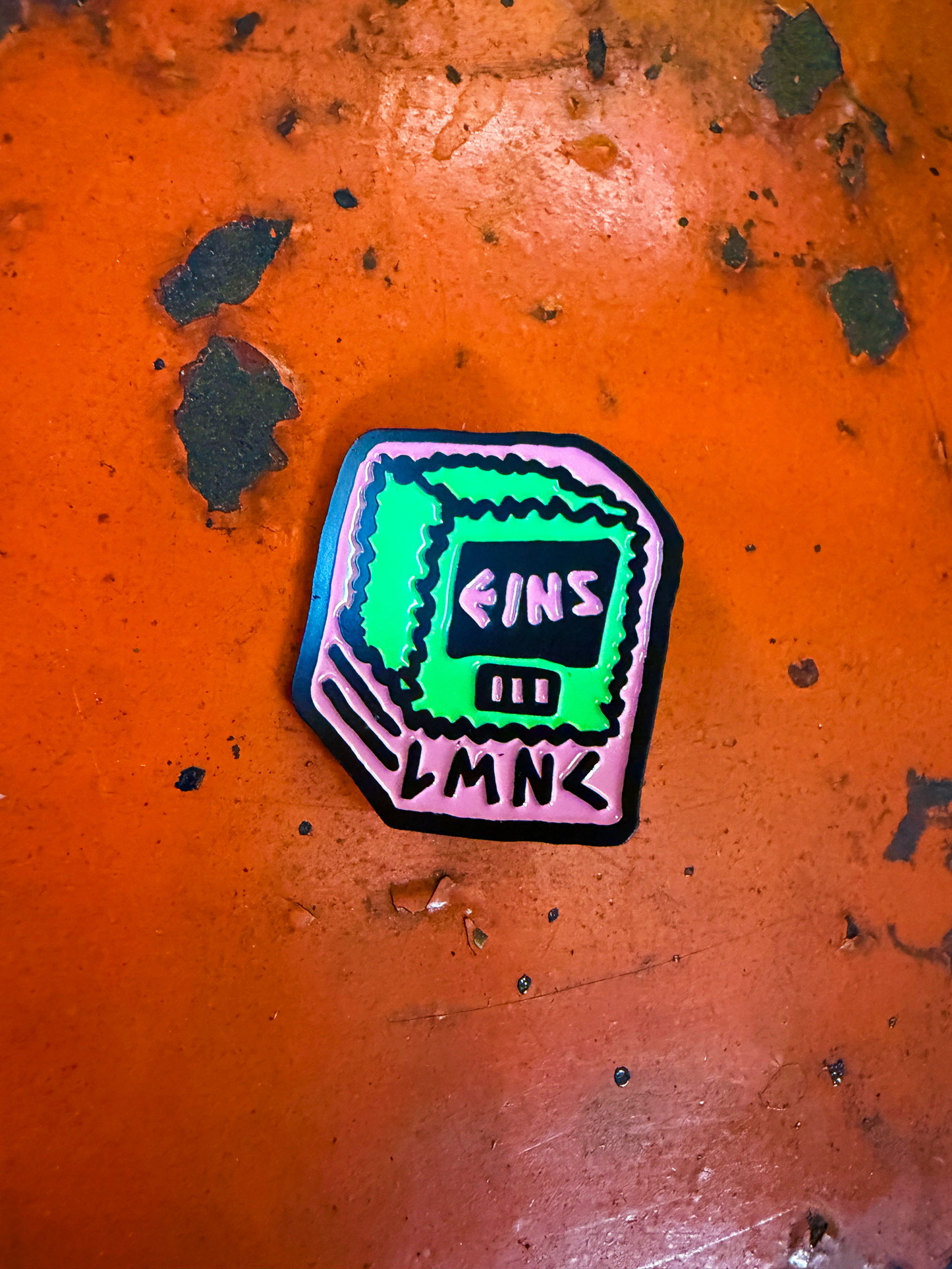 Eins Badge